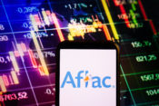 While Aflac reports earning hit, Wall Street takes it in stride.