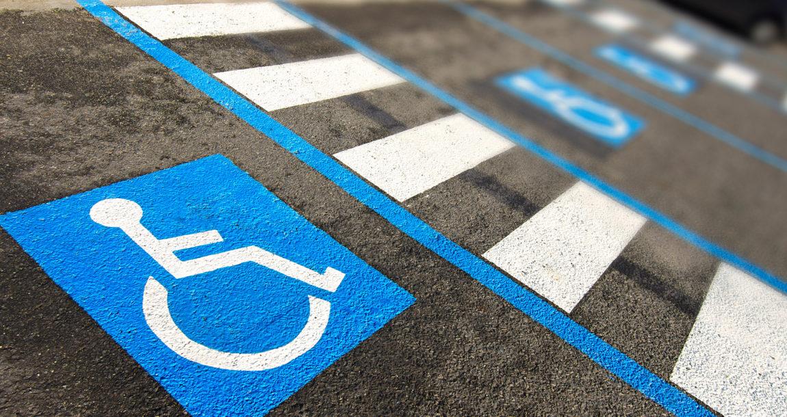 Image of handicap icon on parking space.