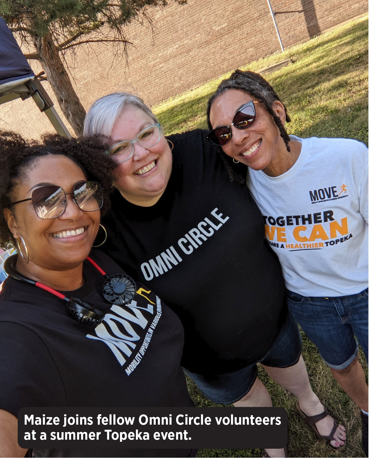 Maize joins fellow Omni Circle volunteers at a summer Topeka event.