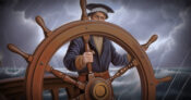 captain at the wheel of an old wooden ship