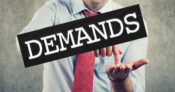 Photo shows a man with his hand out and the word "Demands" across his image.