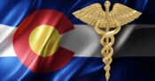 Image of the state flag of Colorado with a medical caduceus superimposed. Colorado seeks rehabilitation order for Friday Health Plans.