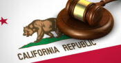 Image shows a judge's gavel over an old California flag design