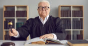 Image shows a judge pounding a gavel