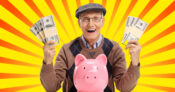 Photo of a happy senior citizen holding wads of cash while standing behind a pink piggy bank. How to approach retirement planning for $2M-plus wealth market.