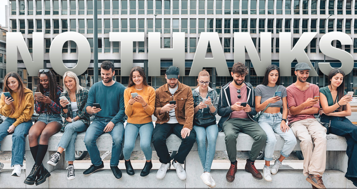 Image of a group of Gen Z aged people with a large "No Thanks" sign behind them. Five reasons Gen Z isn’t buying life insurance.