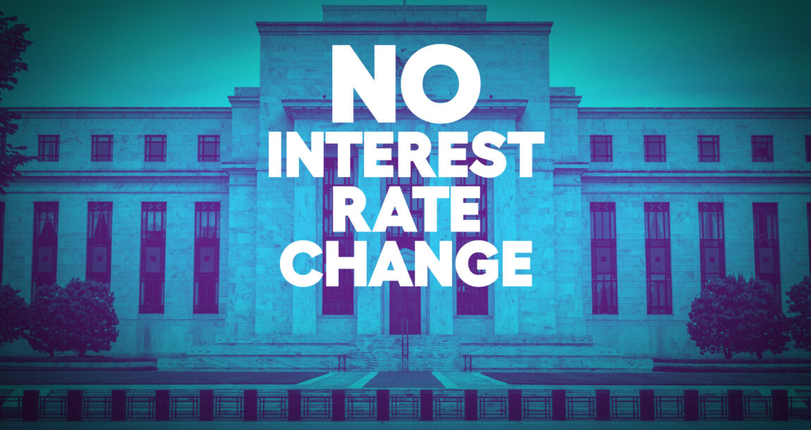 Image of the Treasury Building in Washington, D.C., with the words "No Interest rate change" superimposed.