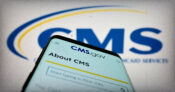 Image of a mobile phone showing the CMS.gov website's "About CMS" page, with the CMS logo in the background.