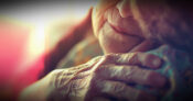 Image of an elderly woman hugging a teddy bear. How to overcome-the-challenges-of-selling-long-term-care-insurance.