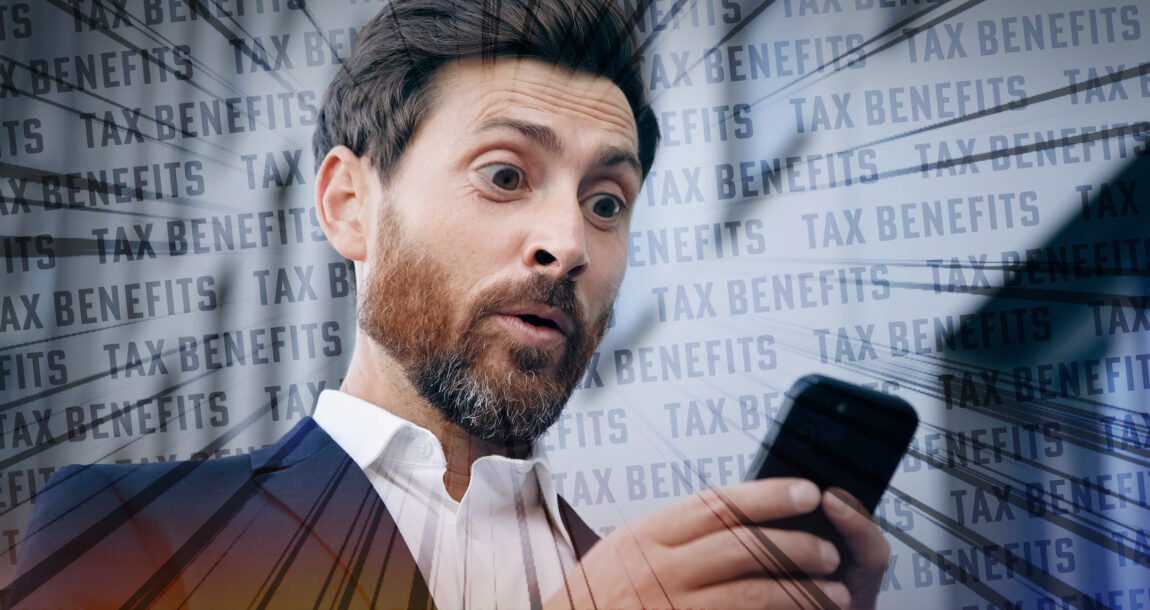 Image of man looking reading about tax benefits and looking surprised. One-third-of-consumers-unaware-of-life-insurance-tax-benefits.