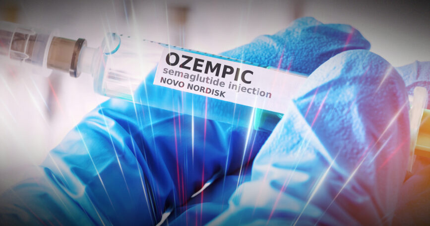 Photo of a medically gloved hand holding a syringe for an Ozempic injection. Insurers-urged-to-be-ready-for-Ozempic-craze-discuss-coverage-with-clients.