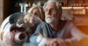 Image of senior couple looking concerned as they sit aside a symbolic piggy bank. Retirement-confidence-at-record-low-but-will-it-improve.