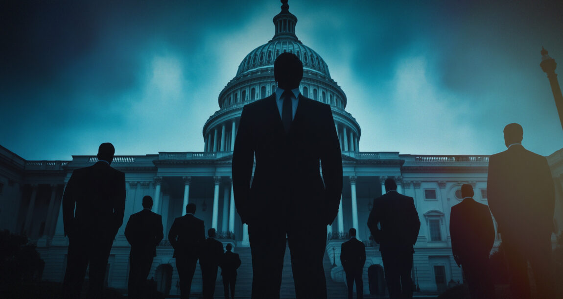 Image shows people shadowed in front of the Capitol.