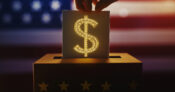 Image shows an American flag in the background with a dollar symbol in a ballot box.