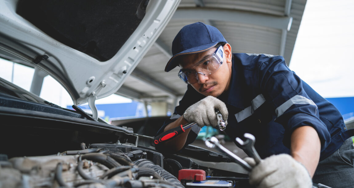 Image of auto mechanic working on car repairs. Repair cycle times, costs drive customer satisfaction for auto claims, study finds.