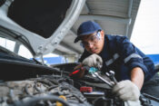 Image of auto mechanic working on car repairs. Repair cycle times, costs drive customer satisfaction for auto claims, study finds.