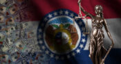 Image shows the Missouri flag and seal.