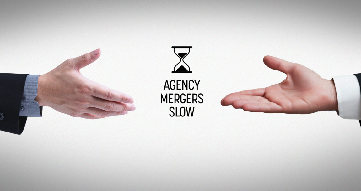 Photo illustration showing two hands moving apart rather than shaking hands, with the title "Agency Mergers Slow." 2024-insurance-agency-mergers-slow-show-signs-of-surge-in-2025.