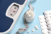 Illustration of a scale with weight loss drugs and a tape measure on top. Weight loss drugs top the list for price negotiations.