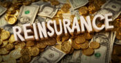 Image shows money with the word, "Reinsurance" over top