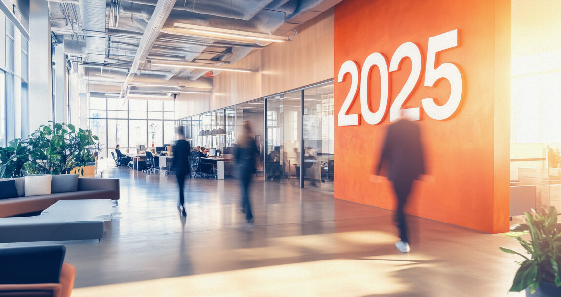 Photo illustration of a workplace with a large "2025" on the wall. Emerging-workplace-benefit-trends-for-2025.