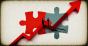 Image of two puzzle pieces with an upward arrow going through them. After-slow-period-insurance-brokerage-MAs-come-roaring-back.