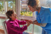 Image of a long-term care patient and medical provider. LTC market will face 'greater strain.' Are solutions already at hand?.