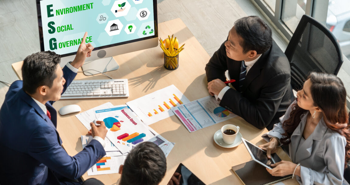 Photo illustration showing financial advisors discussing ESG investments with clients. House passes bill restricting ESG investments in retirement accounts.