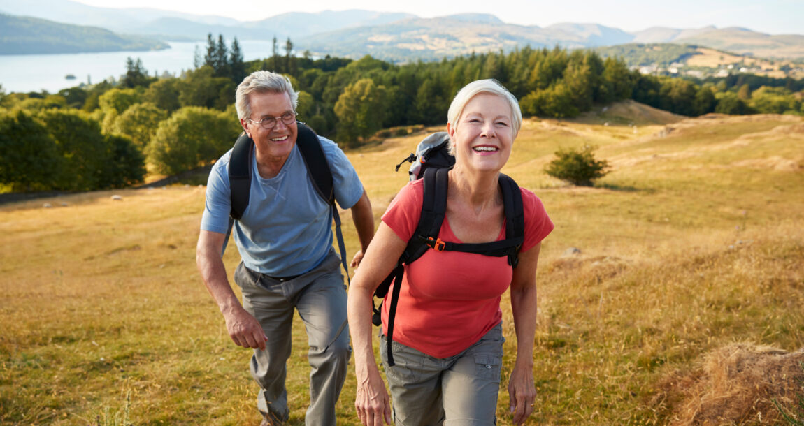 Image showing an active senior couple hiking. Retirement Reimagined: This generation says it's no time to slow down.