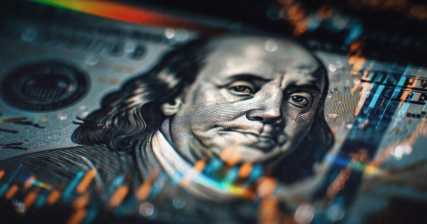 Illustration of $100 bill with colorful sparkles.