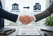 Image shows two men shaking hands.