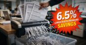 Image shows a hand putting several papers into a shredder.
